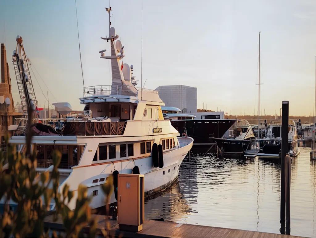 Surveyed motor yacht berthed at sunset
