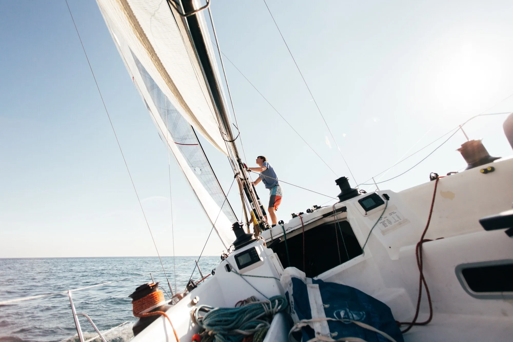 A captain demonstrating helm control aboard a vessel