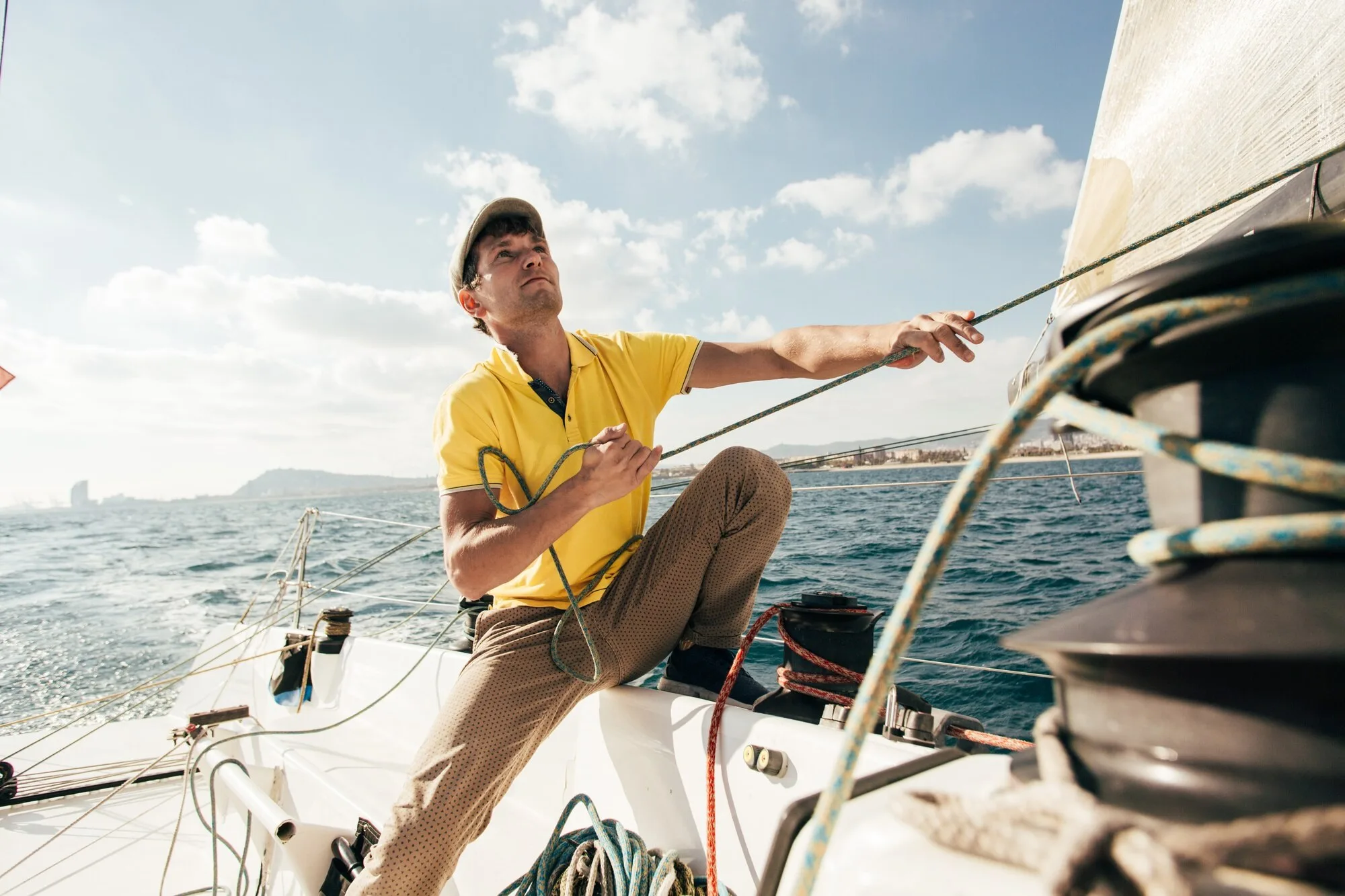 A captain guiding a boater at the helm